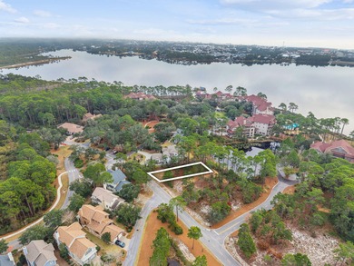 Tucked within the private gates of Wild Heron, 1203 W Water Oak on Sharks Tooth Golf Club in Florida - for sale on GolfHomes.com, golf home, golf lot