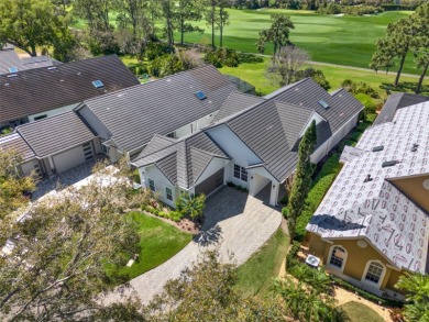 Located steps away from the golf practice facility, in the on Lake Nona Golf Club, Inc. in Florida - for sale on GolfHomes.com, golf home, golf lot