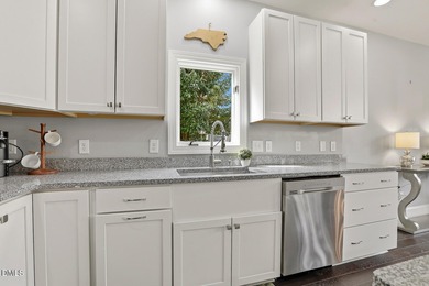 Perfectly positioned overlooking the 11th fairway of Wildwood on Wildwood Green Golf Club in North Carolina - for sale on GolfHomes.com, golf home, golf lot