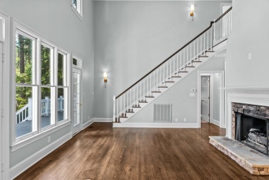 SWEEPING LAKE VIEWS, STEPS FROM THE 18TH HOLE AT GREAT WATERS on Great Waters Course At Reynolds Plantation in Georgia - for sale on GolfHomes.com, golf home, golf lot
