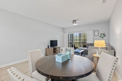 Welcome to this beautiful turn-key and fully furnished 2nd floor on The Valley At Eastport in South Carolina - for sale on GolfHomes.com, golf home, golf lot