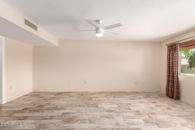 Discover Sun City Living in this charming 2-bed, 2-bath Gemini on Sun City Lakes West and East in Arizona - for sale on GolfHomes.com, golf home, golf lot