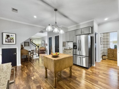 Inviting 3-bedroom, 2.5-bath home on a beautifully landscaped on Charleston National Golf Club in South Carolina - for sale on GolfHomes.com, golf home, golf lot