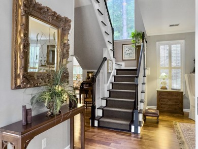 Inviting 3-bedroom, 2.5-bath home on a beautifully landscaped on Charleston National Golf Club in South Carolina - for sale on GolfHomes.com, golf home, golf lot