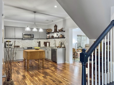 Inviting 3-bedroom, 2.5-bath home on a beautifully landscaped on Charleston National Golf Club in South Carolina - for sale on GolfHomes.com, golf home, golf lot