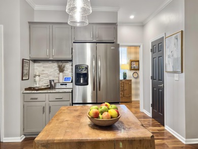 Inviting 3-bedroom, 2.5-bath home on a beautifully landscaped on Charleston National Golf Club in South Carolina - for sale on GolfHomes.com, golf home, golf lot