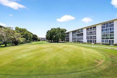 BEAUTIFUL 1 BEDRM-1+1/2 BATHRMS WITH INSIDE WASHER & DRYER on Wynmoor Golf Course in Florida - for sale on GolfHomes.com, golf home, golf lot