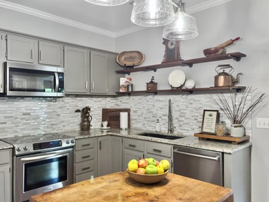 Inviting 3-bedroom, 2.5-bath home on a beautifully landscaped on Charleston National Golf Club in South Carolina - for sale on GolfHomes.com, golf home, golf lot