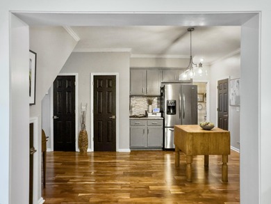 Inviting 3-bedroom, 2.5-bath home on a beautifully landscaped on Charleston National Golf Club in South Carolina - for sale on GolfHomes.com, golf home, golf lot