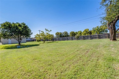 Stunning home, remodeled in 2023, situated on a .684 acre lot on Lake Kiowa Golf Course in Texas - for sale on GolfHomes.com, golf home, golf lot