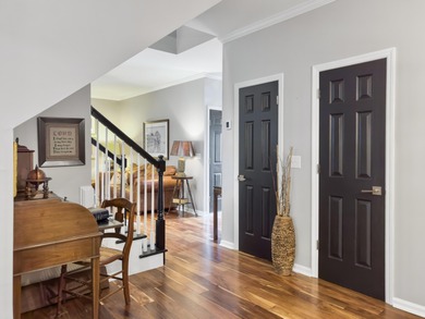 Inviting 3-bedroom, 2.5-bath home on a beautifully landscaped on Charleston National Golf Club in South Carolina - for sale on GolfHomes.com, golf home, golf lot