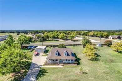 Stunning home, remodeled in 2023, situated on a .684 acre lot on Lake Kiowa Golf Course in Texas - for sale on GolfHomes.com, golf home, golf lot