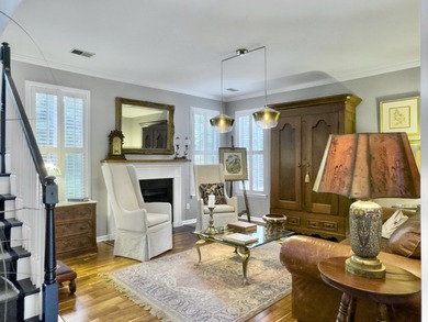 Inviting 3-bedroom, 2.5-bath home on a beautifully landscaped on Charleston National Golf Club in South Carolina - for sale on GolfHomes.com, golf home, golf lot