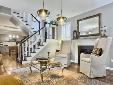 Inviting 3-bedroom, 2.5-bath home on a beautifully landscaped on Charleston National Golf Club in South Carolina - for sale on GolfHomes.com, golf home, golf lot