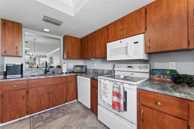 Welcome to easy living in this beautiful, spacious 2-bedroom on Highland Lakes Executive Golf Course in Florida - for sale on GolfHomes.com, golf home, golf lot