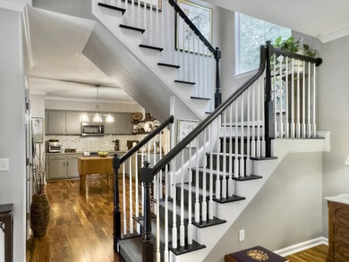 Inviting 3-bedroom, 2.5-bath home on a beautifully landscaped on Charleston National Golf Club in South Carolina - for sale on GolfHomes.com, golf home, golf lot