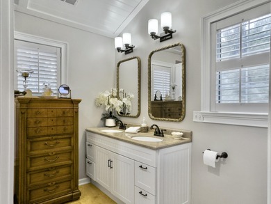 Inviting 3-bedroom, 2.5-bath home on a beautifully landscaped on Charleston National Golf Club in South Carolina - for sale on GolfHomes.com, golf home, golf lot