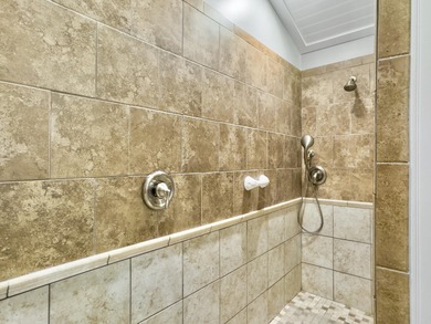 Inviting 3-bedroom, 2.5-bath home on a beautifully landscaped on Charleston National Golf Club in South Carolina - for sale on GolfHomes.com, golf home, golf lot