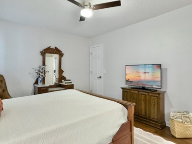 Inviting 3-bedroom, 2.5-bath home on a beautifully landscaped on Charleston National Golf Club in South Carolina - for sale on GolfHomes.com, golf home, golf lot