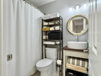 Inviting 3-bedroom, 2.5-bath home on a beautifully landscaped on Charleston National Golf Club in South Carolina - for sale on GolfHomes.com, golf home, golf lot