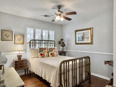 Inviting 3-bedroom, 2.5-bath home on a beautifully landscaped on Charleston National Golf Club in South Carolina - for sale on GolfHomes.com, golf home, golf lot