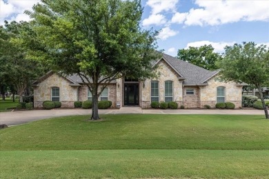 Beautiful home in coveted Pecan Plantation.  Open floor plan on Pecan Plantation Country Club in Texas - for sale on GolfHomes.com, golf home, golf lot