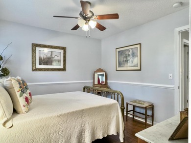 Inviting 3-bedroom, 2.5-bath home on a beautifully landscaped on Charleston National Golf Club in South Carolina - for sale on GolfHomes.com, golf home, golf lot