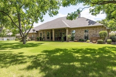 Beautiful home in coveted Pecan Plantation.  Open floor plan on Pecan Plantation Country Club in Texas - for sale on GolfHomes.com, golf home, golf lot