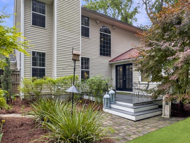 Inviting 3-bedroom, 2.5-bath home on a beautifully landscaped on Charleston National Golf Club in South Carolina - for sale on GolfHomes.com, golf home, golf lot