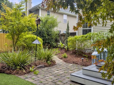 Inviting 3-bedroom, 2.5-bath home on a beautifully landscaped on Charleston National Golf Club in South Carolina - for sale on GolfHomes.com, golf home, golf lot