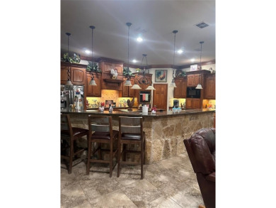 Beautiful home in coveted Pecan Plantation.  Open floor plan on Pecan Plantation Country Club in Texas - for sale on GolfHomes.com, golf home, golf lot