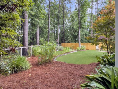 Inviting 3-bedroom, 2.5-bath home on a beautifully landscaped on Charleston National Golf Club in South Carolina - for sale on GolfHomes.com, golf home, golf lot