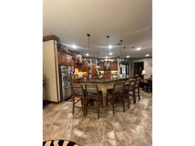 Beautiful home in coveted Pecan Plantation.  Open floor plan on Pecan Plantation Country Club in Texas - for sale on GolfHomes.com, golf home, golf lot