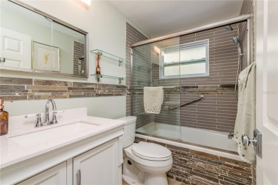Meticulously maintained 2 bed, 2 bath Dunedin home featuring a on The Dunedin Country Club in Florida - for sale on GolfHomes.com, golf home, golf lot
