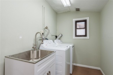 Meticulously maintained 2 bed, 2 bath Dunedin home featuring a on The Dunedin Country Club in Florida - for sale on GolfHomes.com, golf home, golf lot