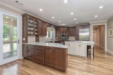 This stunning 4-bedroom, 4-bath home offers a refined living on Reynolds Lake Oconee - The Oconee in Georgia - for sale on GolfHomes.com, golf home, golf lot