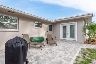 Meticulously maintained 2 bed, 2 bath Dunedin home featuring a on The Dunedin Country Club in Florida - for sale on GolfHomes.com, golf home, golf lot