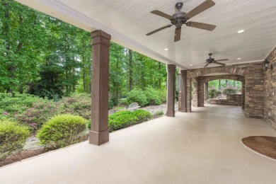 This stunning 4-bedroom, 4-bath home offers a refined living on Reynolds Lake Oconee - The Oconee in Georgia - for sale on GolfHomes.com, golf home, golf lot