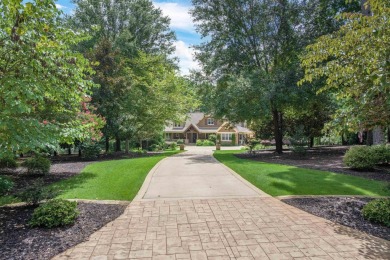 This stunning 4-bedroom, 4-bath home offers a refined living on Reynolds Lake Oconee - The Oconee in Georgia - for sale on GolfHomes.com, golf home, golf lot