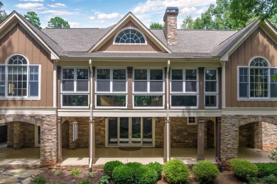 This stunning 4-bedroom, 4-bath home offers a refined living on Reynolds Lake Oconee - The Oconee in Georgia - for sale on GolfHomes.com, golf home, golf lot