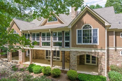 This stunning 4-bedroom, 4-bath home offers a refined living on Reynolds Lake Oconee - The Oconee in Georgia - for sale on GolfHomes.com, golf home, golf lot