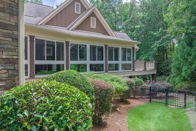 This stunning 4-bedroom, 4-bath home offers a refined living on Reynolds Lake Oconee - The Oconee in Georgia - for sale on GolfHomes.com, golf home, golf lot