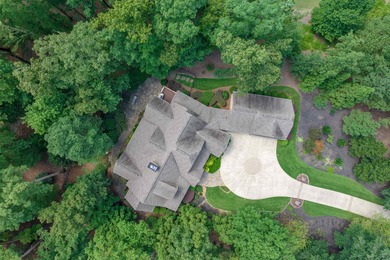 This stunning 4-bedroom, 4-bath home offers a refined living on Reynolds Lake Oconee - The Oconee in Georgia - for sale on GolfHomes.com, golf home, golf lot