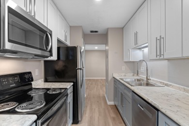 Buyer financing fell through. Well maintained quadraplex that is on Hilaman Park Golf Course in Florida - for sale on GolfHomes.com, golf home, golf lot
