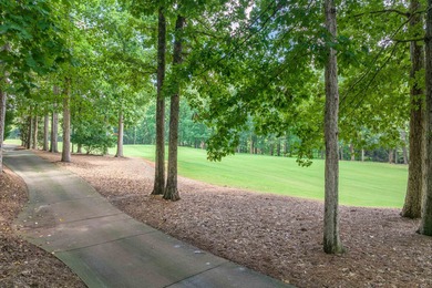 This stunning 4-bedroom, 4-bath home offers a refined living on Reynolds Lake Oconee - The Oconee in Georgia - for sale on GolfHomes.com, golf home, golf lot