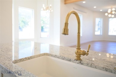 Discover luxury living in this meticulously renovated 4 bed, 2.5 on The Old Works Golf Course in Montana - for sale on GolfHomes.com, golf home, golf lot