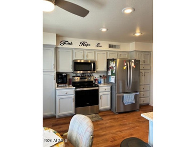 You will love this beautiful updated home. In Picture Perfect on Sunland Village East Golf Course in Arizona - for sale on GolfHomes.com, golf home, golf lot