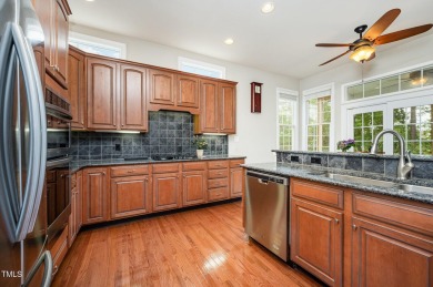 Welcome to this beautifully maintained brick-front home nestled on Brier Creek Country Club in North Carolina - for sale on GolfHomes.com, golf home, golf lot