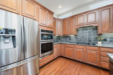 Welcome to this beautifully maintained brick-front home nestled on Brier Creek Country Club in North Carolina - for sale on GolfHomes.com, golf home, golf lot