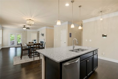 Welcome to 137 Golden Eagle Lane, where comfort meets elegance on Cobbs Glen Country Club in South Carolina - for sale on GolfHomes.com, golf home, golf lot